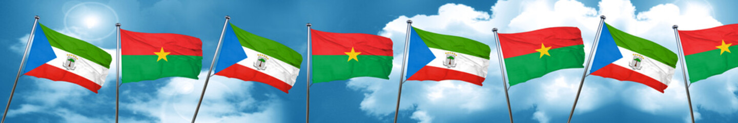 Equatorial guinea flag with Burkina Faso flag, 3D rendering