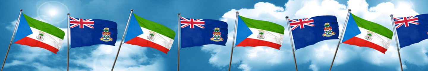 Equatorial guinea flag with Cayman islands flag, 3D rendering