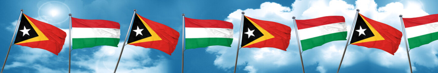 east timor flag with Hungary flag, 3D rendering