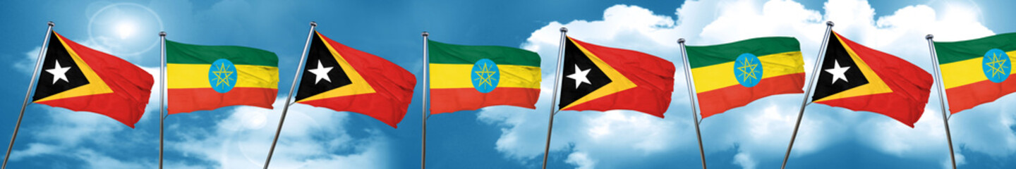 east timor flag with Ethiopia flag, 3D rendering