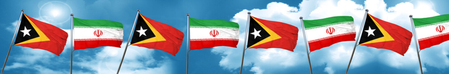 east timor flag with Iran flag, 3D rendering