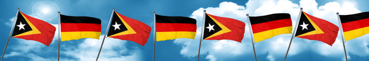east timor flag with Germany flag, 3D rendering