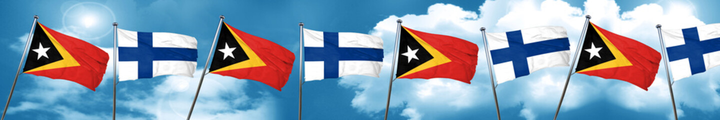 east timor flag with Finland flag, 3D rendering