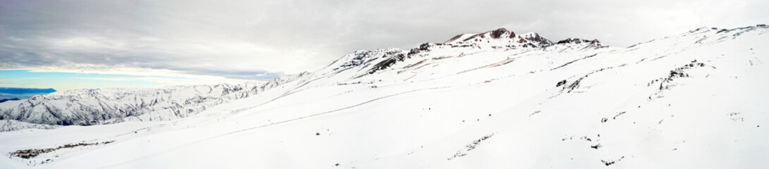Fototapeta na wymiar El Colorado and La Parva Ski Resorts Winter Snow Panorama - Andes Mountains, Santiago, Chile