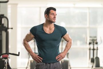 Portrait of Muscle Man in Green T-shirt