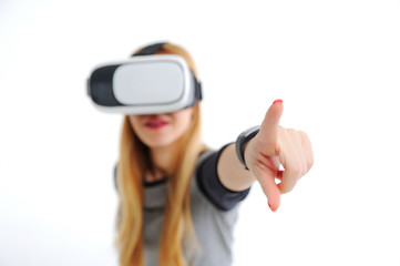 Young girl with glasses of virtual reality on a white background