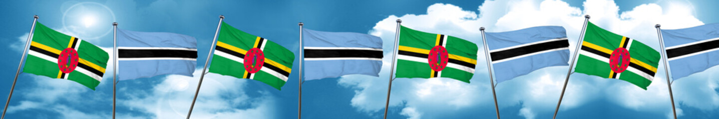 Dominica flag with Botswana flag, 3D rendering