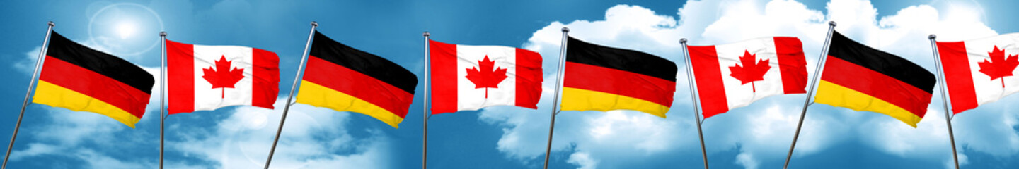 German flag with Canada flag, 3D rendering