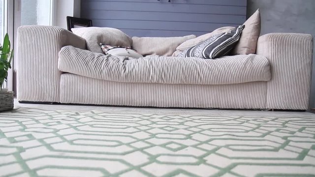sofa is light at the window in the loft