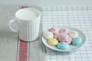 Colored meringue with milk.