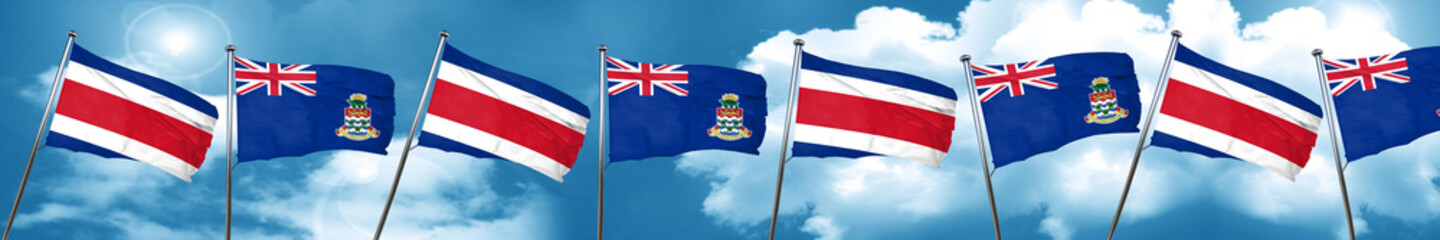 Costa Rica flag with Cayman islands flag, 3D rendering