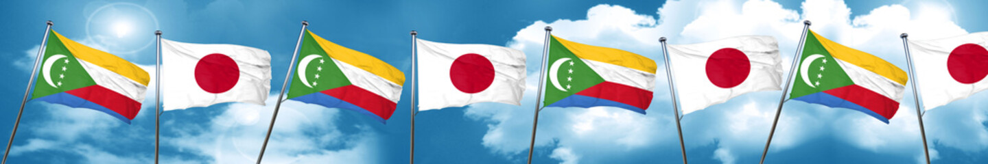 Fototapeta na wymiar Comoros flag with Japan flag, 3D rendering