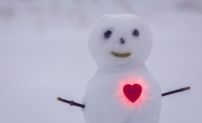 heart and snowman. Happy Valentine's day.
