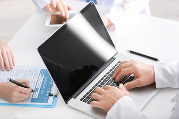 Fototapeta premium Doctors at work in clinic