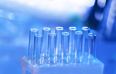 Test tubes on blurred background