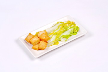 Fototapeta na wymiar Spicy mixed vegetable salad with sliced Thai white pork sausage