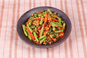 Spicy fried cowpea with minced pork call Pad Ped Tua.