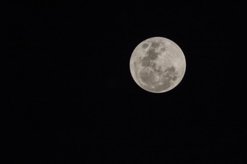 Blur moon with isolated black sky background for text adding