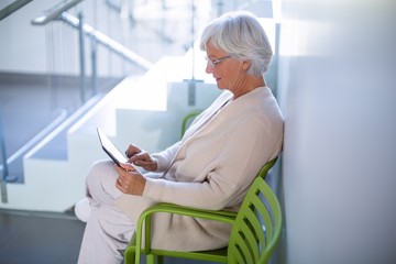 Senior woman using digital tablet