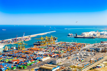 Fototapeta na wymiar Barcelona, Spain. July 6, 2016. Industrial port with containers.