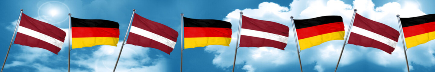 Latvia flag with Germany flag, 3D rendering
