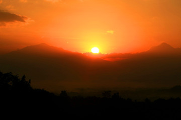 Sunrise at Punthuk Setumbu. Punthuk Setumbu is one of the hill which is quite high with great panorama view in the region of Borobudur, Magelang, Central Java, Indonesia