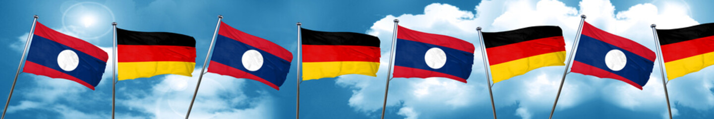 Laos flag with Germany flag, 3D rendering