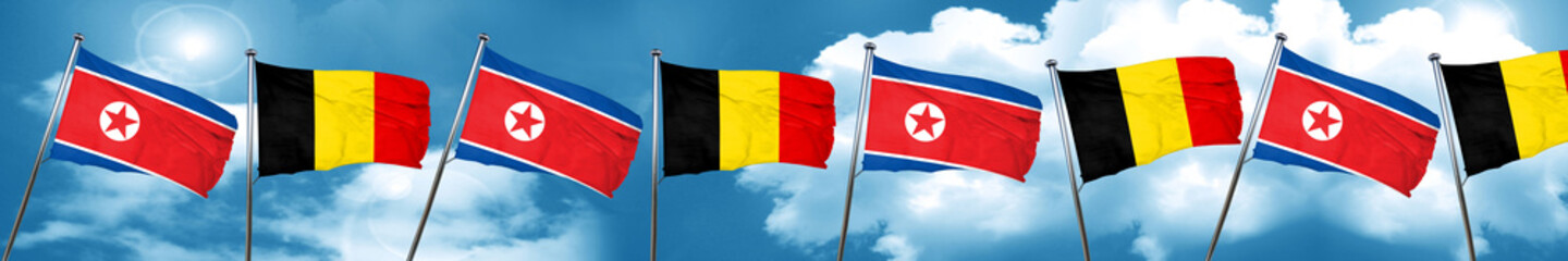 North Korea flag with Belgium flag, 3D rendering