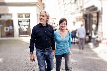 Senior Couple Walking Through The Streets Of Tuebingen