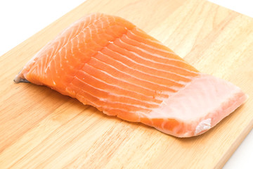 fresh salmon on wood board