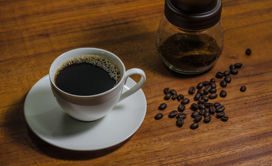 Black coffee on the wooden table