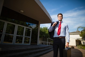 Businessman holding briefcase