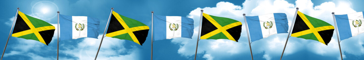 Jamaica flag with Guatemala flag, 3D rendering