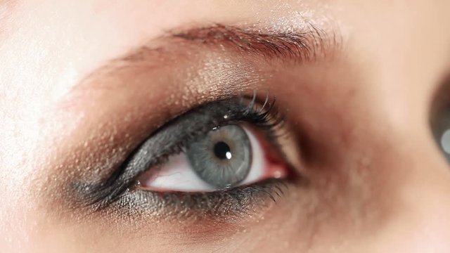 Closeup video of woman eye with evening makeup