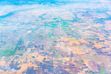 Naklejka premium View of the ground from airplane window .