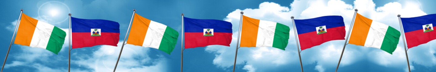 Ivory coast flag with Haiti flag, 3D rendering