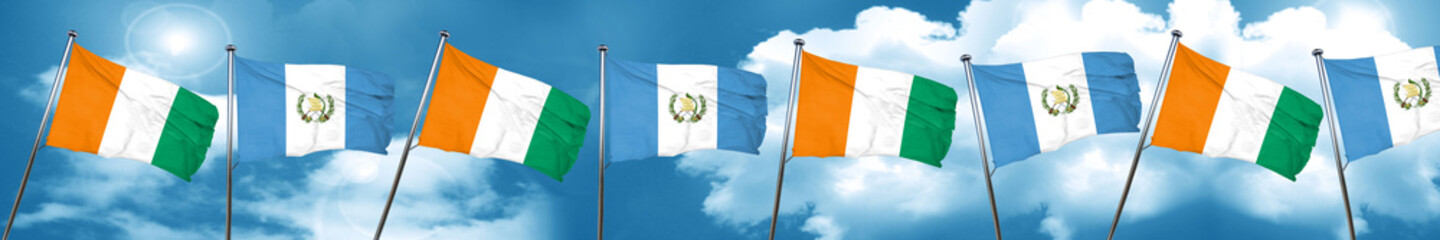 Ivory coast flag with Guatemala flag, 3D rendering