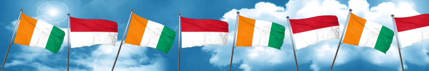 Ivory coast flag with Indonesia flag, 3D rendering