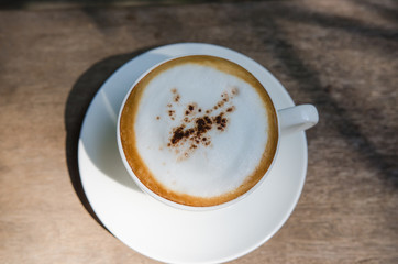 Barista making a cup of coffee soft focus image .