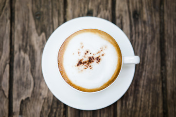 Barista making a cup of coffee soft focus image .