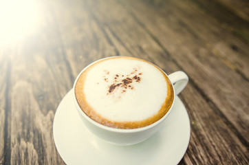 Barista making a cup of coffee soft focus image .