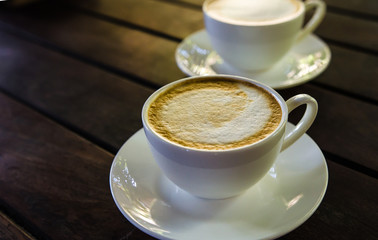 Barista making a cup of coffee soft focus image .
