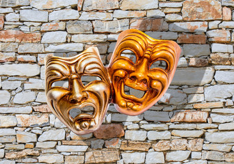 Comedy and Tragedy theatrical venetian mask burning