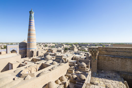 Islam Khoja (Khodja) Minaret in Itchan Kala, the walled inner town of the city of Khiva, Uzbekistan. UNESCO World Heritage