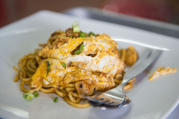 fried noodle with pork and egg , Thai food
