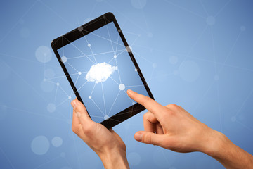 Female hand holding tablet