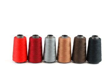 colorful sewing thread isolated on white background