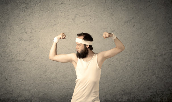 Young male showing muscles