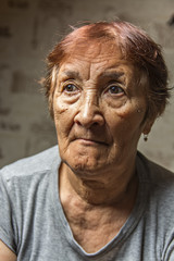 portrait of a pensive elderly woman 