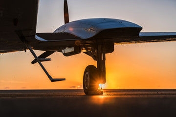 small plane on the runway
